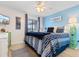 Bedroom with king-size bed, coastal decor, and ocean view at 6000 N Ocean Blvd. # 317, North Myrtle Beach, SC 29582