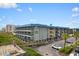 Gray building with blue roof and ocean view at 6000 N Ocean Blvd. # 317, North Myrtle Beach, SC 29582