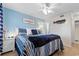 Main bedroom with king-size bed and coastal decor at 6000 N Ocean Blvd. # 317, North Myrtle Beach, SC 29582