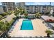 Relaxing community pool with plenty of lounge chairs at 6000 N Ocean Blvd. # 317, North Myrtle Beach, SC 29582