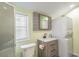 Clean bathroom with stackable washer and dryer at 6001-1654 South Kings Hwy., Myrtle Beach, SC 29575