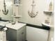 Bathroom with sink, gray vanity, and nautical decor at 6001-1655 South Kings Hwy., Myrtle Beach, SC 29575