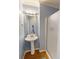 Cozy bathroom featuring a white pedestal sink and walk-in shower, exuding a clean aesthetic at 6001-1709 South Kings Hwy., Myrtle Beach, SC 29575