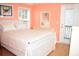 Well-lit bedroom with a full bed, dresser, and access to a balcony at 6001-1709 South Kings Hwy., Myrtle Beach, SC 29575
