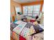 Bright bedroom featuring twin beds with colorful patterns, window, and dresser at 6001-1709 South Kings Hwy., Myrtle Beach, SC 29575
