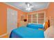 Cozy bedroom featuring twin beds, dresser, window, and ceiling fan at 6001-1709 South Kings Hwy., Myrtle Beach, SC 29575