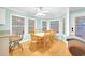Bright dining room with a large table, seating for eight, and plenty of natural light at 6001-1709 South Kings Hwy., Myrtle Beach, SC 29575