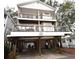 Two-story beach house with wraparound deck and parking underneath at 6001-1709 South Kings Hwy., Myrtle Beach, SC 29575