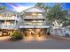 Two-story beach house with wraparound deck and parking underneath at 6001-1709 South Kings Hwy., Myrtle Beach, SC 29575