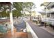 Exterior shot showing a neighborhood street with a grill and deck on the side of the building at 6001-1709 South Kings Hwy., Myrtle Beach, SC 29575