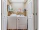 Laundry room featuring a washer and dryer and open shelving for storage at 6001-1709 South Kings Hwy., Myrtle Beach, SC 29575
