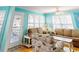 Inviting living room with lots of windows, a view of the balcony, and cozy seating at 6001-1709 South Kings Hwy., Myrtle Beach, SC 29575