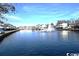 Beautiful water view with a fountain and waterfront homes, showcasing the community's prime location at 6001-1709 South Kings Hwy., Myrtle Beach, SC 29575