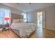 Bright bedroom with a plush bed, nightstands, and access to a private bathroom at 603 Hatteras River Rd., Myrtle Beach, SC 29588