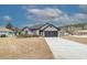 Brick house with a dark gray garage door at 603 Hatteras River Rd., Myrtle Beach, SC 29588