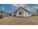 Side view of the house showcasing a fence at 603 Hatteras River Rd., Myrtle Beach, SC 29588