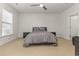 Comfortable bedroom with a queen-size bed and ceiling fan at 6172 Catalina Dr. # 911, North Myrtle Beach, SC 29582