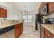 Spacious kitchen with granite countertops and wood cabinets at 6172 Catalina Dr. # 911, North Myrtle Beach, SC 29582