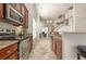 Well-equipped kitchen featuring granite countertops and stainless steel appliances at 6172 Catalina Dr. # 911, North Myrtle Beach, SC 29582