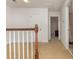 Upper level hallway with neutral carpeting, leading to bedrooms at 6172 Catalina Dr. # 911, North Myrtle Beach, SC 29582