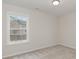 Bright bedroom with neutral walls and carpeted floors at 640 Woodside Dr., Conway, SC 29526