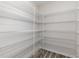 Bright walk-in pantry with ample shelving at 640 Woodside Dr., Conway, SC 29526