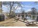 Relaxing deck overlooking a tranquil pond, complete with seating and grill at 6624 Lagoon Pl., Myrtle Beach, SC 29572