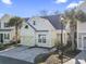 Charming two-story home with light green siding at 6624 Lagoon Pl., Myrtle Beach, SC 29572