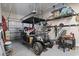 Garage with golf cart and storage shelves at 6624 Lagoon Pl., Myrtle Beach, SC 29572