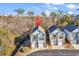 Aerial view of townhome and surrounding trees at 670 2Nd Ave. N, North Myrtle Beach, SC 29582