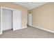 Bedroom with carpet flooring and double door closet at 670 2Nd Ave. N, North Myrtle Beach, SC 29582