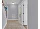 Clean hallway with tile floors and access to stairs at 670 2Nd Ave. N, North Myrtle Beach, SC 29582