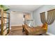 Home office space features a stylish desk, a comfortable chair, a bookshelf and a large display monitor at 690 Choctaw Dr., Conway, SC 29526