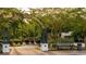 Inviting entrance to 'River Park' featuring lush landscaping and a charming bench at 715 Choctaw Dr., Conway, SC 29526