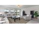 Inviting living room with lots of natural light and stylish furniture, creating a welcoming atmosphere at 715 Choctaw Dr., Conway, SC 29526