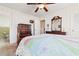 Bright bedroom with a double bed, dresser, and ceiling fan at 7152 Highway 134, Conway, SC 29527