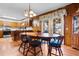 Kitchen and dining area with wood cabinets and a spacious dining table at 7152 Highway 134, Conway, SC 29527