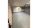 Attached garage with epoxy flooring and ample storage at 803 Sultana Dr., Little River, SC 29566