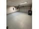 Attached garage with epoxy flooring and ample storage at 803 Sultana Dr., Little River, SC 29566