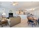 Bright dining area with a table and chairs, adjacent to the living room at 858 Edgewater Dr., Murrells Inlet, SC 29576