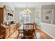 Formal dining room with hardwood floors and a wooden hutch at 858 Edgewater Dr., Murrells Inlet, SC 29576