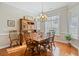 Formal dining room with hardwood floors and a wooden hutch at 858 Edgewater Dr., Murrells Inlet, SC 29576