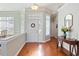 Bright entryway with hardwood floors and a half wall at 858 Edgewater Dr., Murrells Inlet, SC 29576