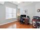 Home office featuring wood desk, two monitors, and hardwood floors at 858 Edgewater Dr., Murrells Inlet, SC 29576