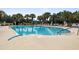 Community pool with lounge chairs and a relaxing atmosphere at 858 Edgewater Dr., Murrells Inlet, SC 29576