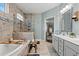 Elegant bathroom with double vanities and a large shower at 860 Villarosa Dr., Myrtle Beach, SC 29572