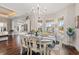 Elegant dining room featuring a chandelier and bay window at 860 Villarosa Dr., Myrtle Beach, SC 29572