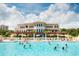 Resort-style pool with many people enjoying the water at 860 Villarosa Dr., Myrtle Beach, SC 29572