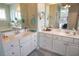 Spacious bathroom with double vanity sinks and mirrors at 905 Adaline Ct., Myrtle Beach, SC 29579