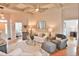 Inviting living room featuring a coffered ceiling, comfortable seating, and an elegant area rug at 905 Adaline Ct., Myrtle Beach, SC 29579